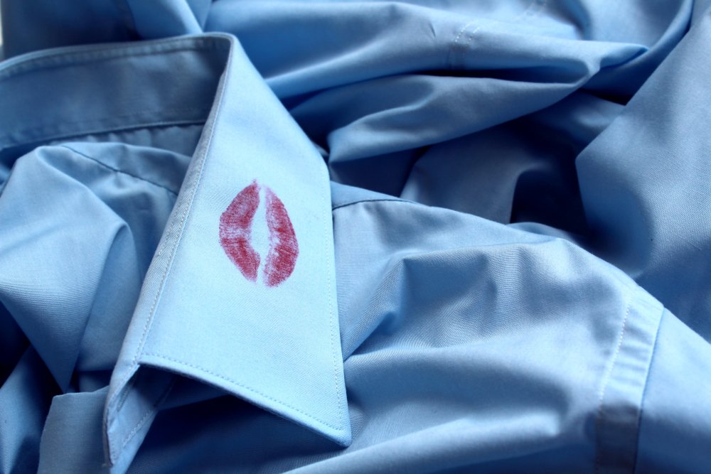 traces of lipstick on the collar of a man's shirt